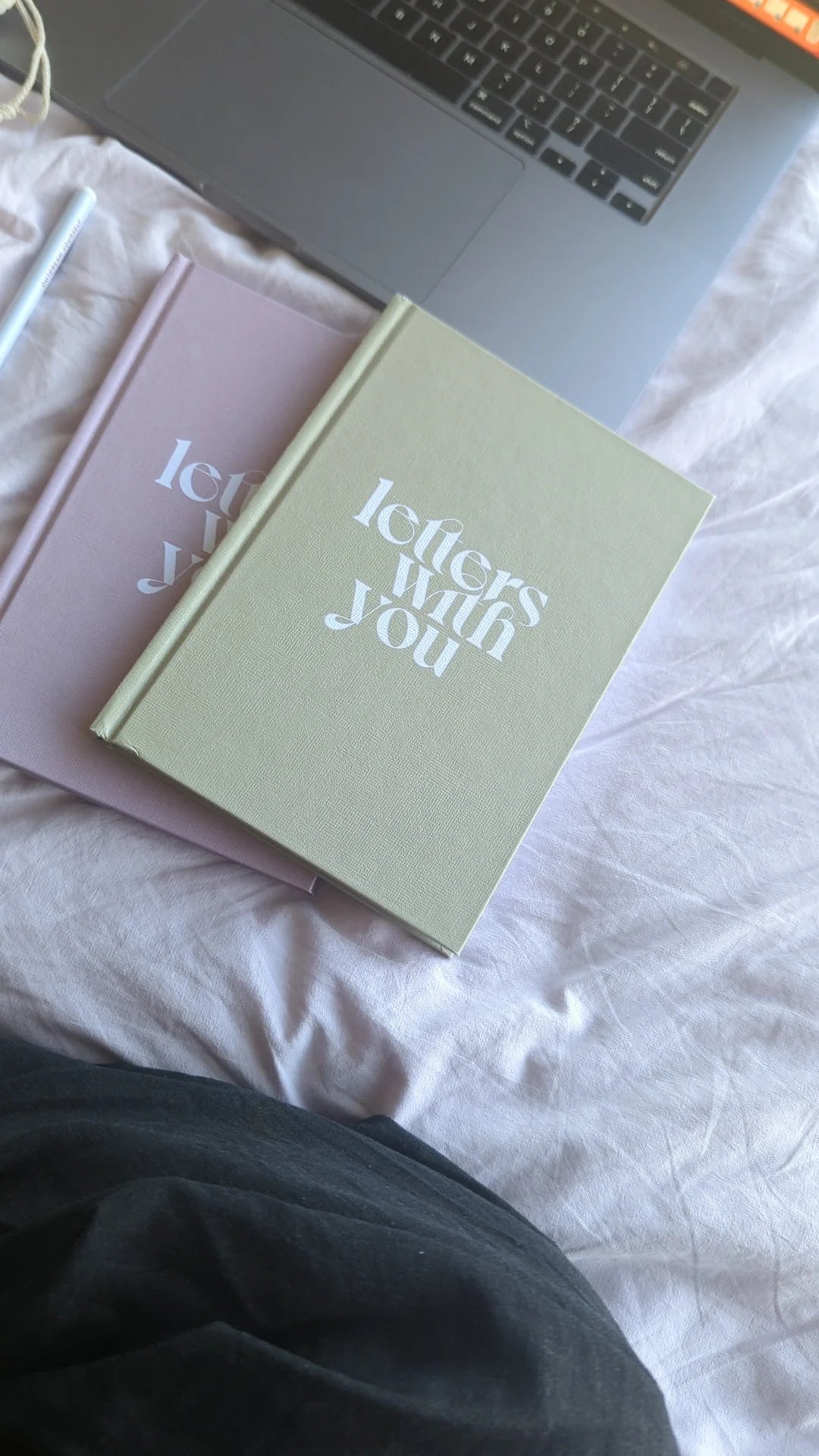 Letters With You shared journal for parents and children, open to a page with writing prompts and illustrations, encouraging connection, reflection, and creativity.